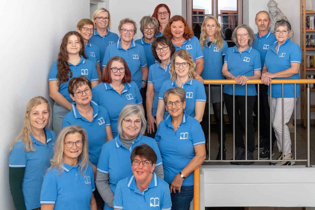 Team auf Stiege